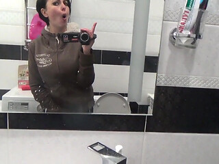 Pissing on the toilet long and a lot after long desperation and a lot of liquids