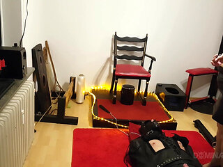 Curvy Brunette Dominatrix Commands Bound Slave in Fetish Dungeon
