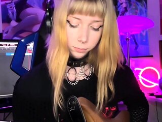 Blonde teen in solo action with her pussy