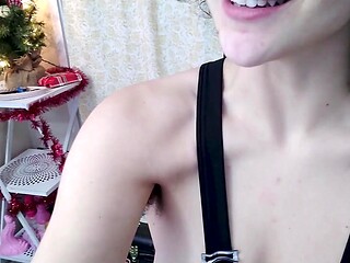 Hairy and pierced Mrs. Claus gives a kinky Christmas blowjob