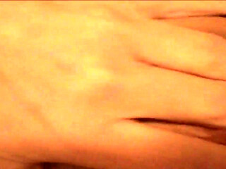 Filming herself masturbating