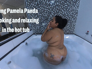 Young Pamela Panda Smoking and Relaxing in the Hot Tub
