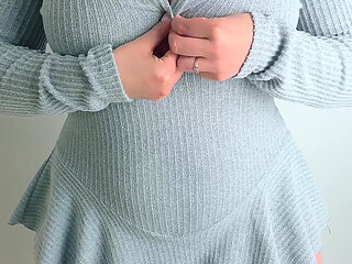 The Wife Buttons up Her Enormous Breasts.
