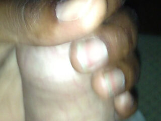Wife stroking uncut cock