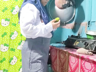 Schoolgirl Masturbates with Cucumbers in the Kitchen