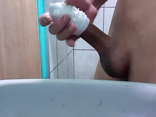 Masturbating