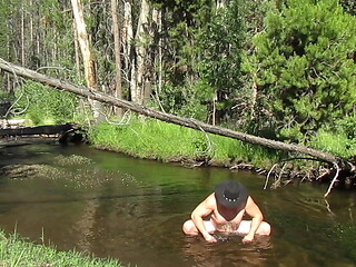 Naked bathing in the creek.