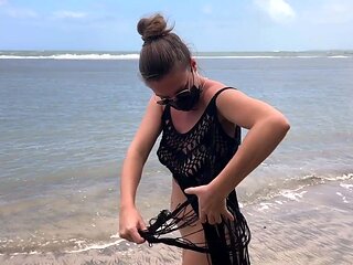 n the beach in a mesh