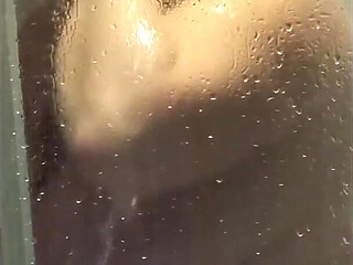 Watch Julie in the Shower Getting Ready for Client