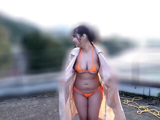 Her Soft Curves Glisten Under the Open Sky as Their Bodies Move in a Silky Rhythm