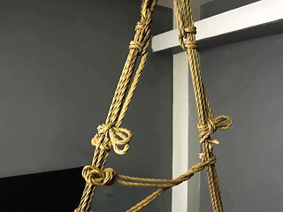 Slutty girl Mila gets tied up and pleasured in intense bondage suspension