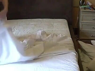 Bed Making in a Chastity Belt