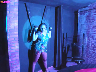 Curvy girl gets tied up and stands at a swinging club while getting fucked.