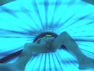 Beautiful solo shemale gets nude in solarium