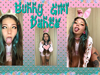 Cute Girl Dancing in a Pink Suit with Ears.