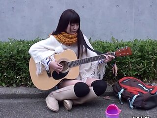 Neko is a girl of multiple talents from playing guitar to riding a cock
