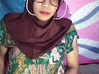 Hijab shemale masturbating in the room
