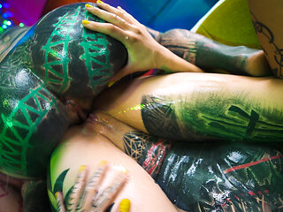 Two punk girls fill the tattooed girl's asshole with cum