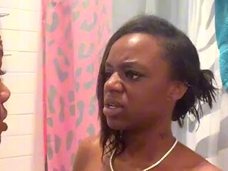 Petite black babe Renity Love gets naked and takes a sensual shower