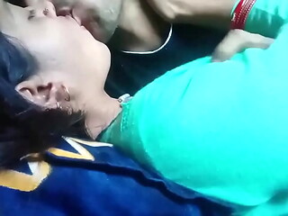 Kissing and pressing boobs of girlfriend