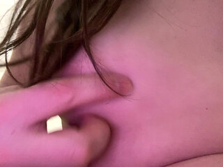 The doll is showing her bare breasts.