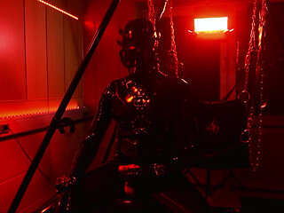 Rubberdrone jerk off in red light