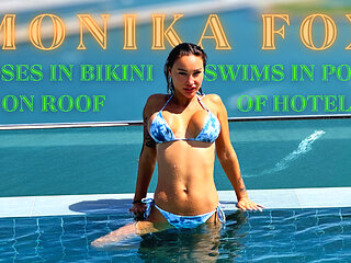 Monika Fox Poses In Bikini & Swims In Pool On Roof Of Hotel