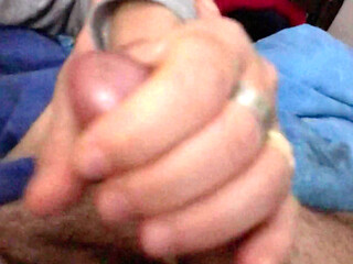 My wife gives me a gorgeous night handjob with a copious cum blast