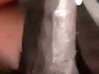 Maskedluv gives a sloppy couch blowjob to kyttkatt