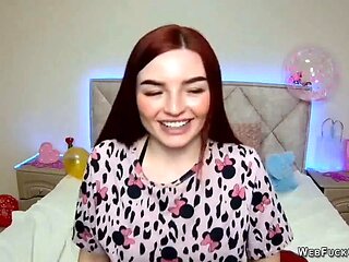 Ginger amateur babe NicolPot with big boobs strips down to bra on webcam