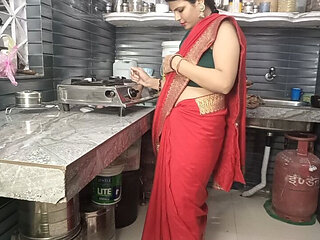 In the Kitchen, Stepbrother Fucks a Beautiful Stepsister in the Red Saree