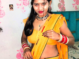 Desi Indian bhabhi in yellow saree looking hot and sexy