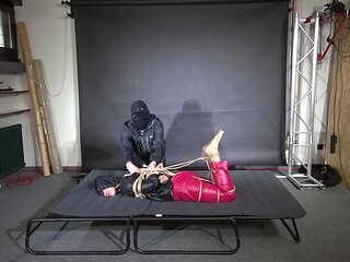 Marie M Tightly Bound And Gagged In Shiny Nylon Rainwear