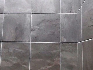 Tattooed goth Raven Black jerks off in public gym shower