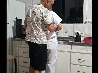 The maid got fucked in the ass in the kitchen while washing the dishes.