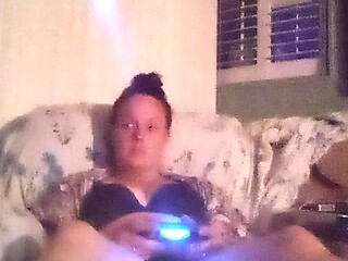 Filming herself in sexy bra and panties while playing video games