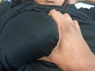 Naughty mom relaxes in bed while her stepson plays with her huge tits and fat ass.