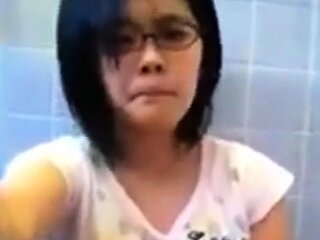 Amateur Asian Girl in Glasses Masturbating