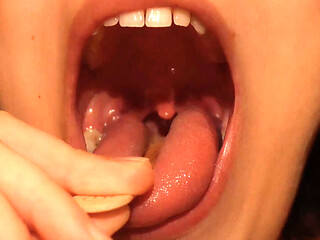 I Eat the Popsicle and Suck on It. After I Eat the Popsicle, I Examine My Mouth and Throat with the Popsicle Stick