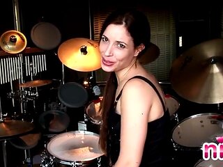 Tattooed solo lesbian masturbates