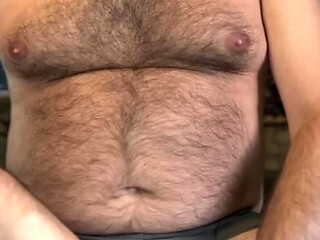 Hairy and gut-strapped cowboy trucker jerks off his small cock