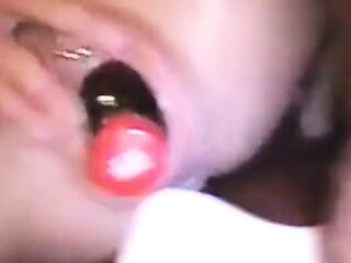 My large cunt filled with a big bottle