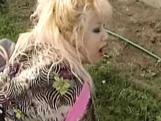 German blonde with big tits takes huge dick outdoors - anal and doggy style