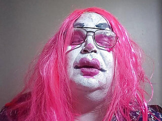 TV clown slut smoking a cigarillo and talking dirty