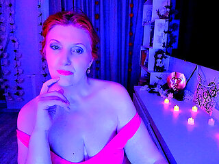 Redhead woman is moving under quite music