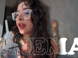 A Girl with a Split Tongue Gives Herself an Enema on Camera