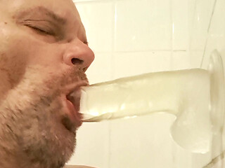 Dildo sucking in the bathtub