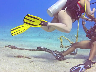Bizzare sex session during SCUBA diving. She takes a huge cock while being 100m underwater