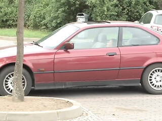 Hot couple makes love in a parked car
