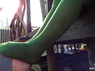 My nylon feet in green tights on your face
